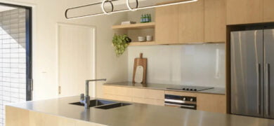 LED Lights installed above a modern kitchen island with pendant fittings, showcasing clean design and bright energy-efficient lighting.