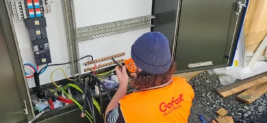 Best electrician near me installing and wiring a commercial electrical switchboard with precision and safety on site