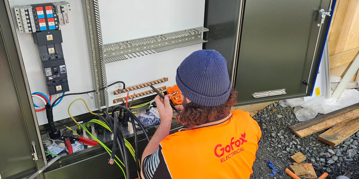 Best electrician near me installing and wiring a commercial electrical switchboard with precision and safety on site