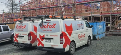 GoFox Electrical Whangārei vans parked outside a construction site, ready for residential electrical work