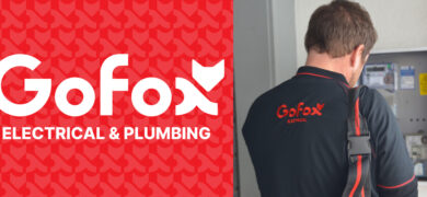 What changes when you join a franchise – GoFox electrical team member working on a switchboard with branded uniform and logo displayed