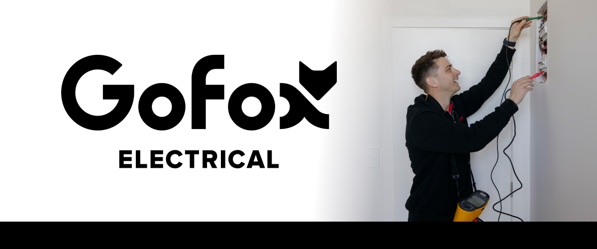 Switchboard upgrade NZ: GoFox Electrical licensed electrician testing a residential switchboard with diagnostic equipment.