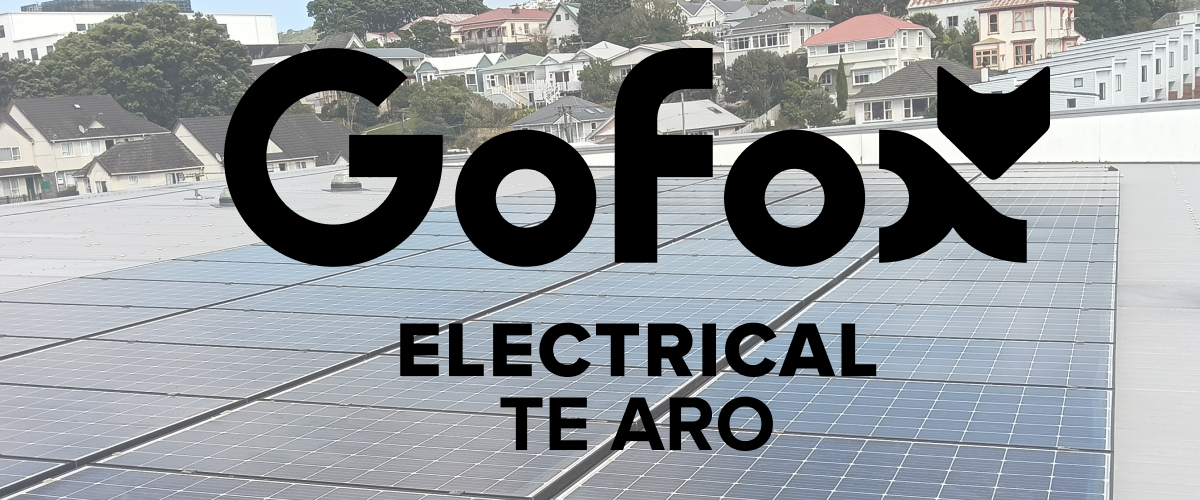 Solar Power Wellington rooftop solar panel installation by GoFox Electrical Te Aro with residential homes in the Wellington hillside background