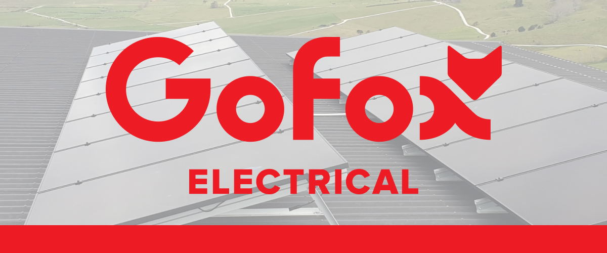 Solar battery: rows of solar panels on a rural New Zealand shed roof, with the GoFox Electrical logo in red.