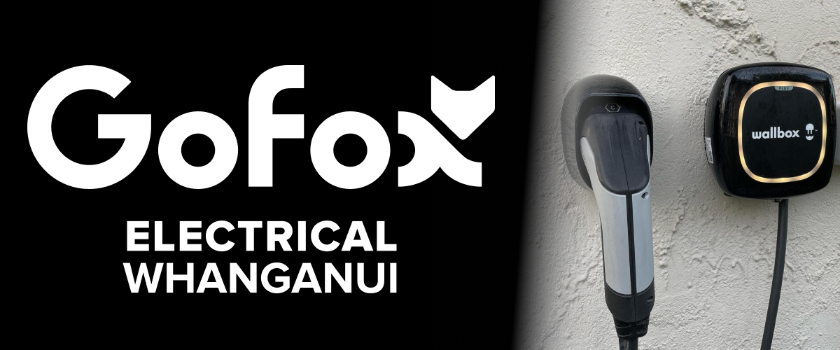 EV Charger Install: two home EV charging units mounted on an exterior wall, GoFox Electrical Whanganui branding.