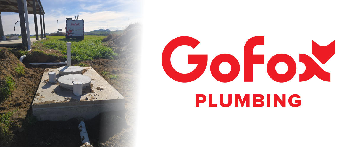 Septic Tank Cost NZ: a newly installed concrete septic tank with access lids set into a rural New Zealand paddock, with a GoFox Plumbing van parked on site.